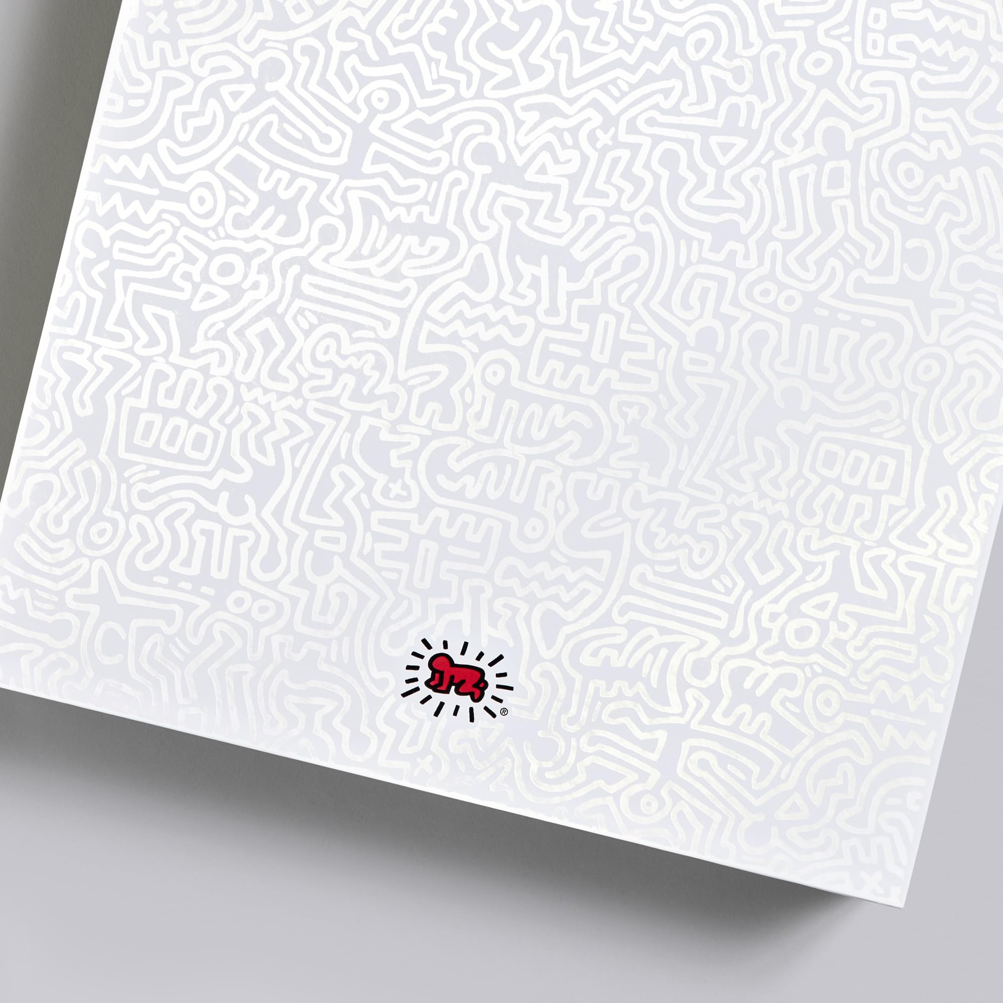 White paper with a red and black logo on a gray background